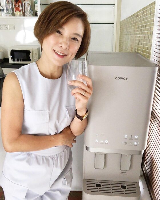 Customer with a Coway water purifier