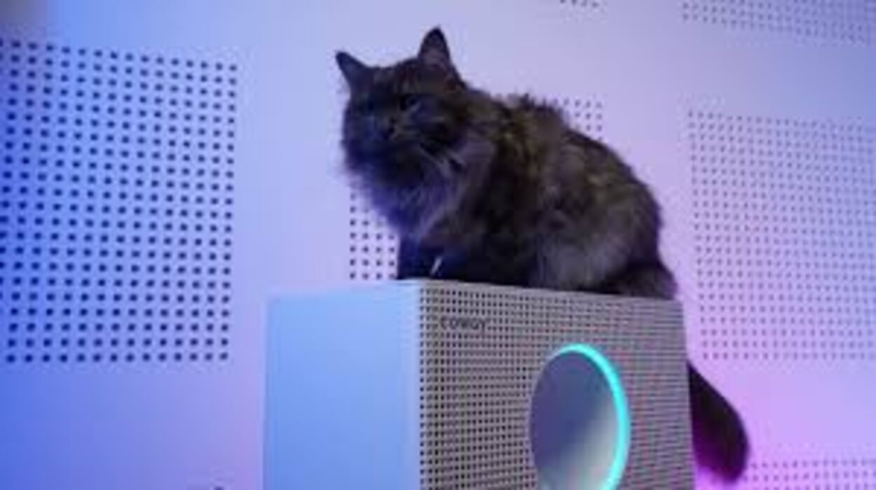 Cat beside a Coway air purifier
